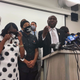 In this Sept. 22, 2020, file photo, attorney Benjamin Crump, at podium, speaks alongside members of Dijon Kizzee’s family during a news conference in Los Angeles. Dijon Kizzee, 29, “posed no threat” to deputies when they fired 19 shots at him, attorney Crump said. An autopsy report says Dijon Kizzee was shot and killed by Los Angeles County sheriff’s deputies, was wounded 16 times in the front and back but it doesn’t shed any light on whether he was on the ground when he was shot. The county coroner’s report supplied to The Associated Press on Friday, Oct. 2, 2020 says Kizzee had four “rapidly life-threatening wounds.”